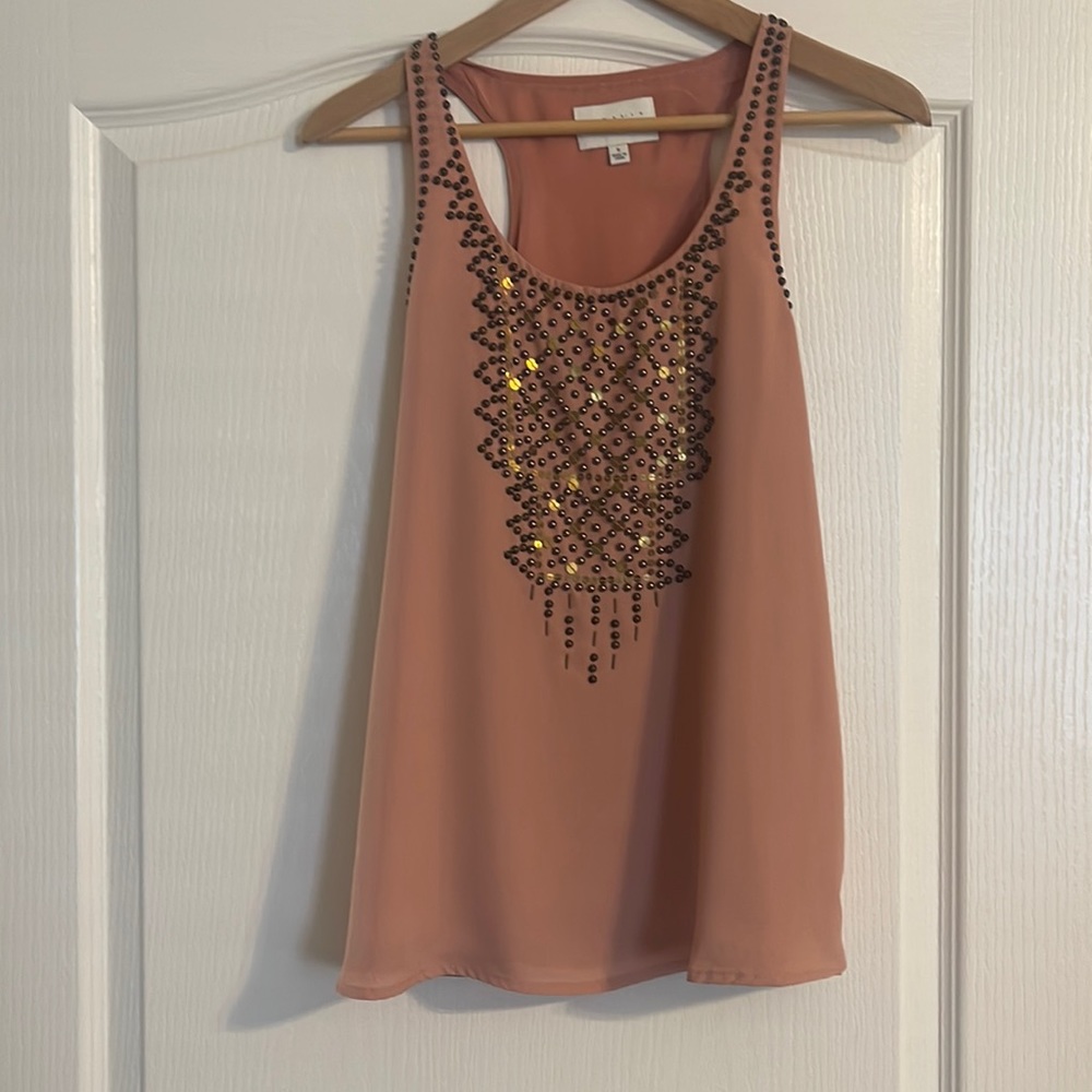 Sabine rust studded top , fully lined Sz Small, no flaws